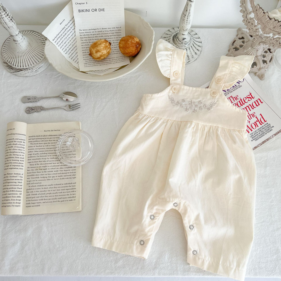 Apricot baby suspender romper laid flat, front side view – adjustable and breathable – beekaaboo.com
