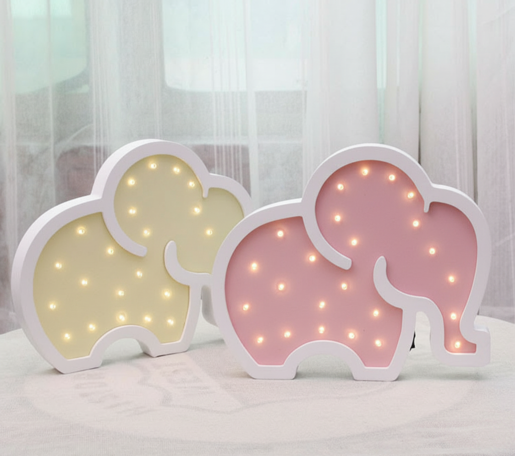 Cute baby elephant LED night lights in pink and yellow colors, perfect nursery decor – beekaaboo.com