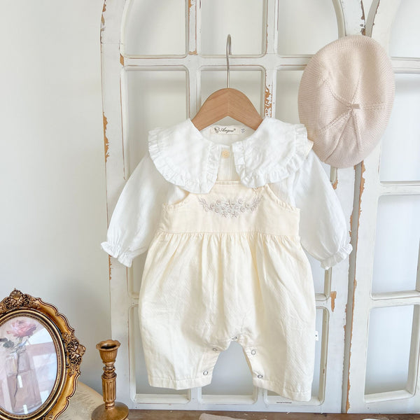Full baby girl outfit with apricot suspender romper and white shirt hanging together – beekaaboo.com