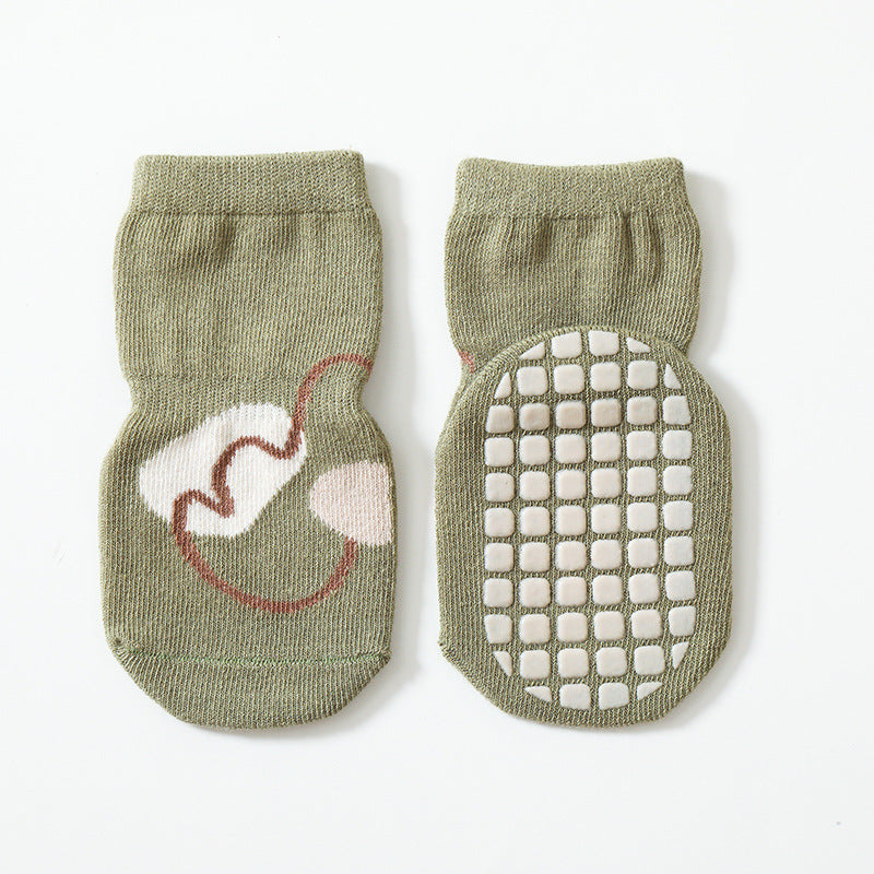 Green cotton baby socks with anti-slip grip – perfect for toddlers – beekaaboo.com