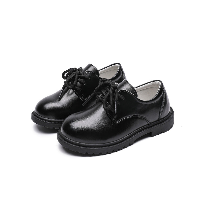 Side view of premium black leather shoes for children, designed for casual and semi-formal occasions – beekaaboo.com