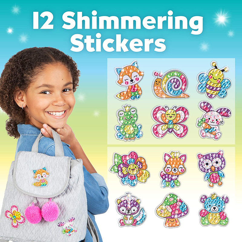 Girl showing backpack decorated with diamond painting stickers – fun creative activity for kids – beekaaboo.com