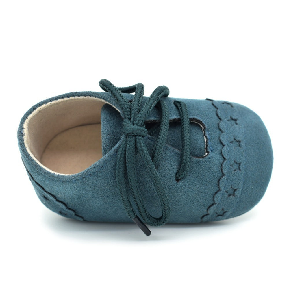 Dark green soft sole baby shoes with lace-up closure, ideal for babies learning to walk. Stylish and breathable – beekaaboo.com