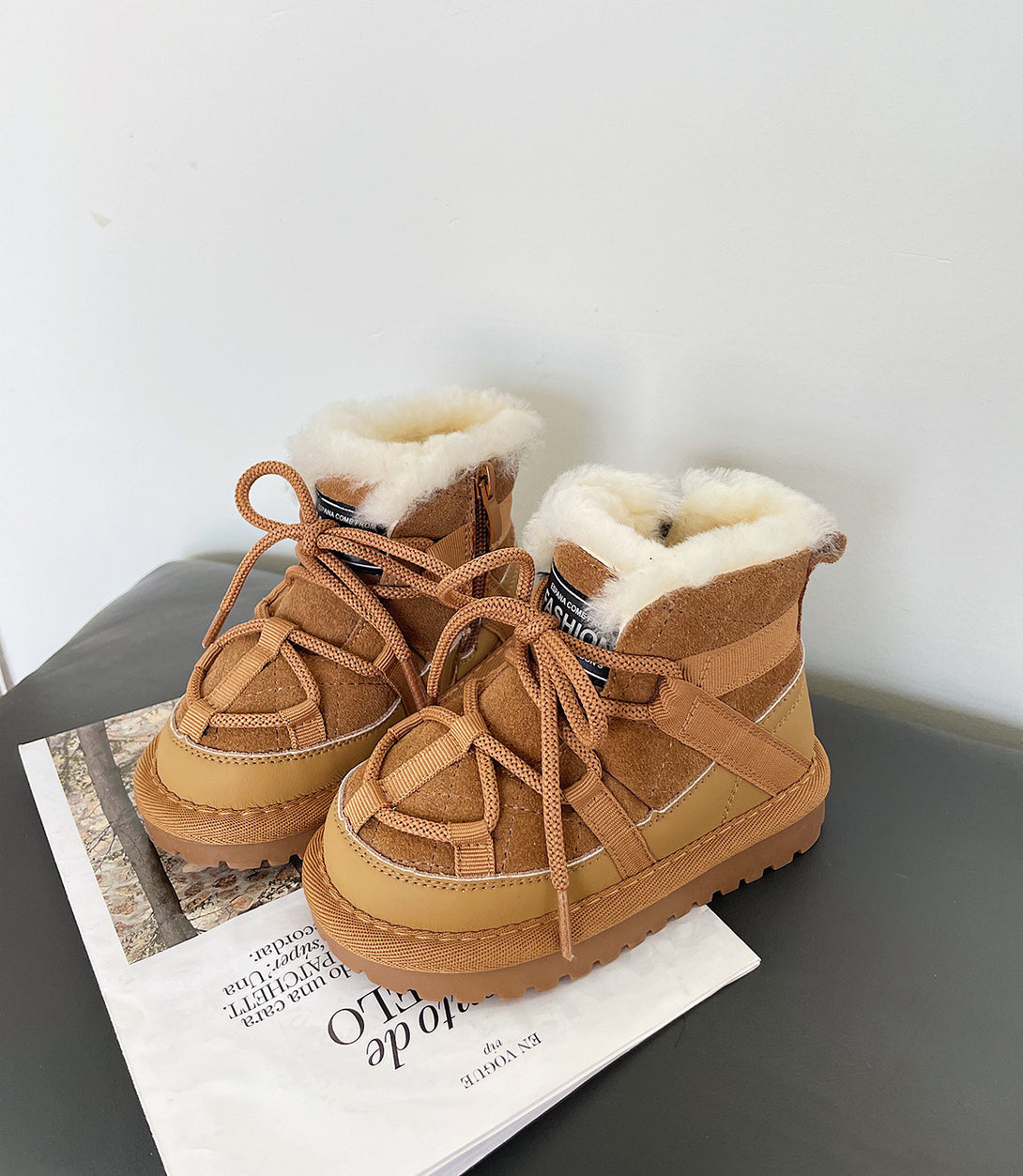 Close-up of camel fleece-lined toddler boots with fluffy warm lining at beekaaboo.com