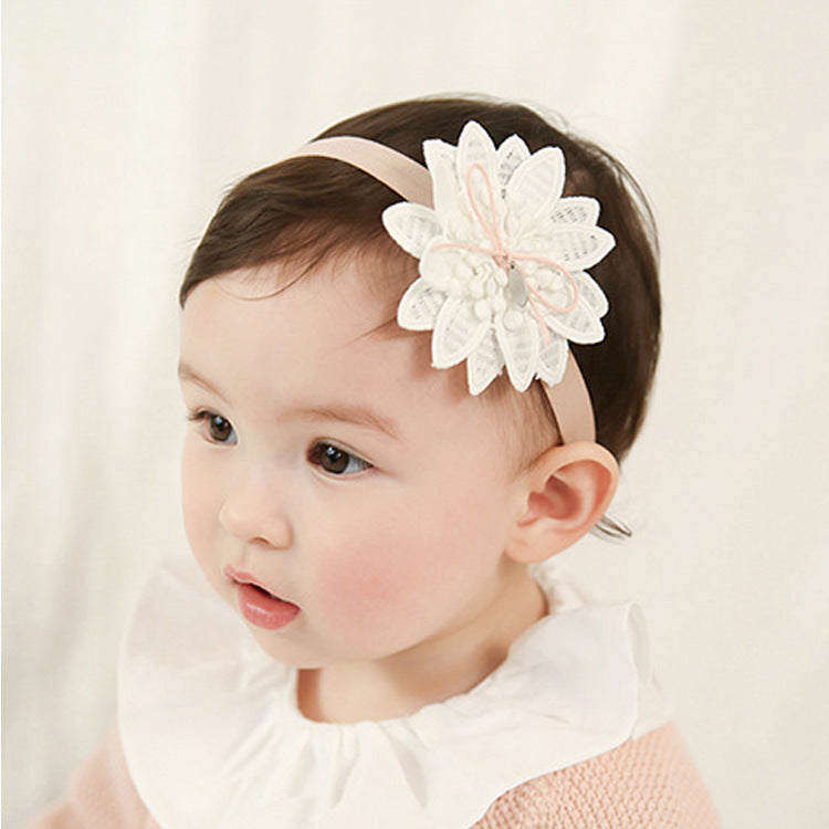 Close-up of flower and stitching on soft fabric hairband – charming and delicate look – beekaaboo.com
