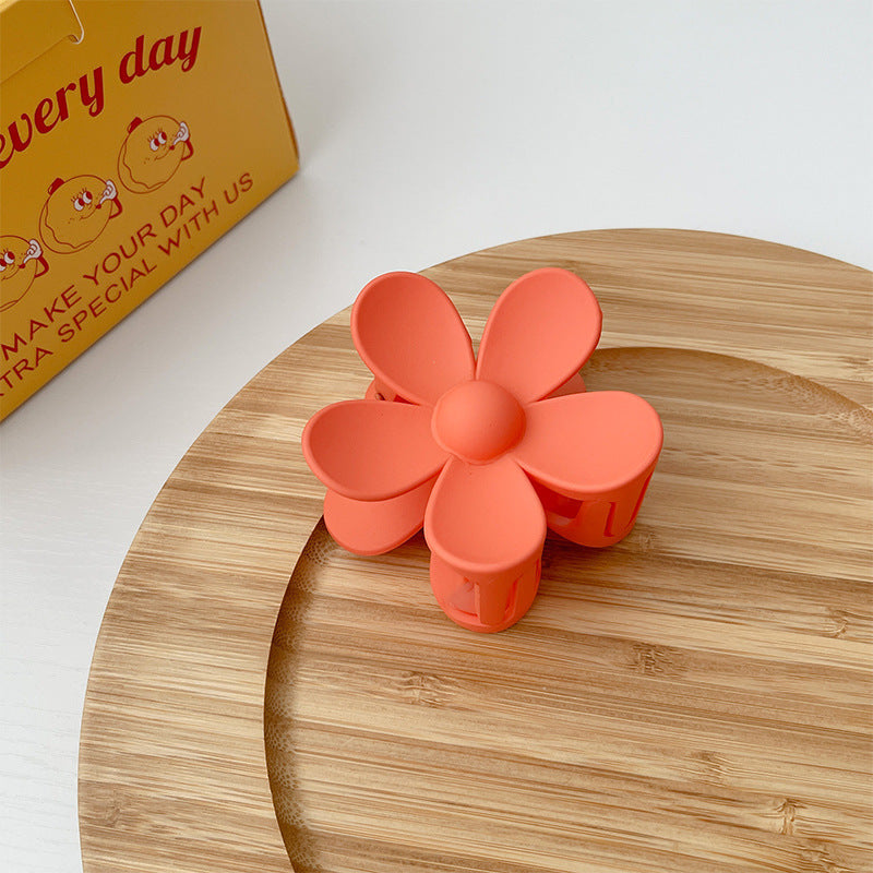 Matte frosted flower hair clip in Orange Big – soft resin claw clip for girls and women – beekaaboo.com