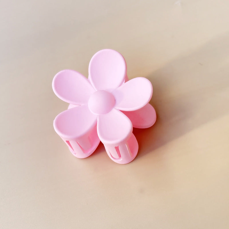 Matte frosted flower hair clip in Pink Small – soft resin claw clip for girls and women – beekaaboo.com