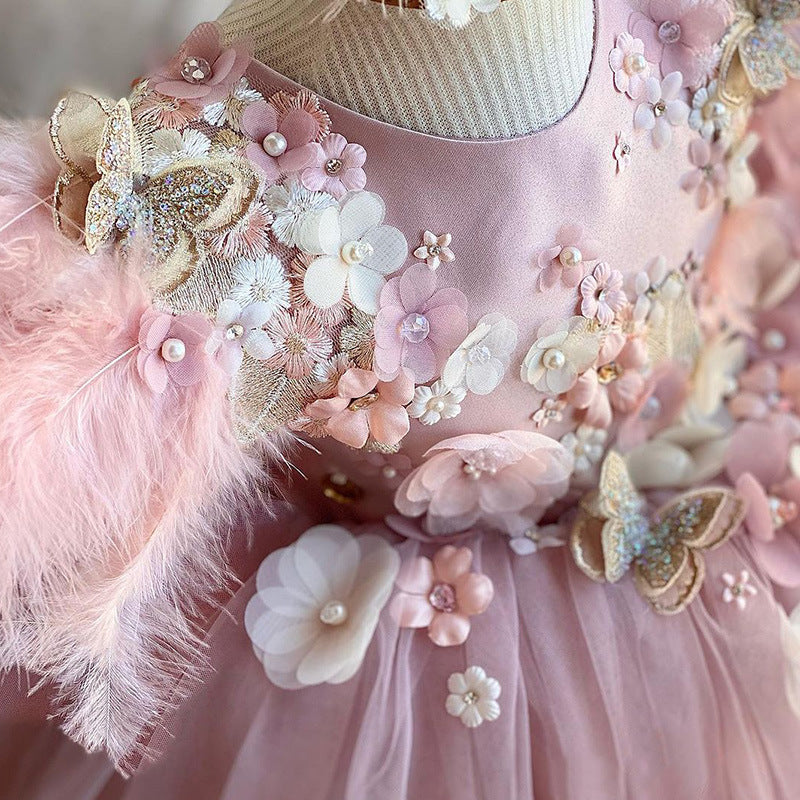 Close-up view of soft pink layered tulle fabric of girls princess dress – beekaaboo.com