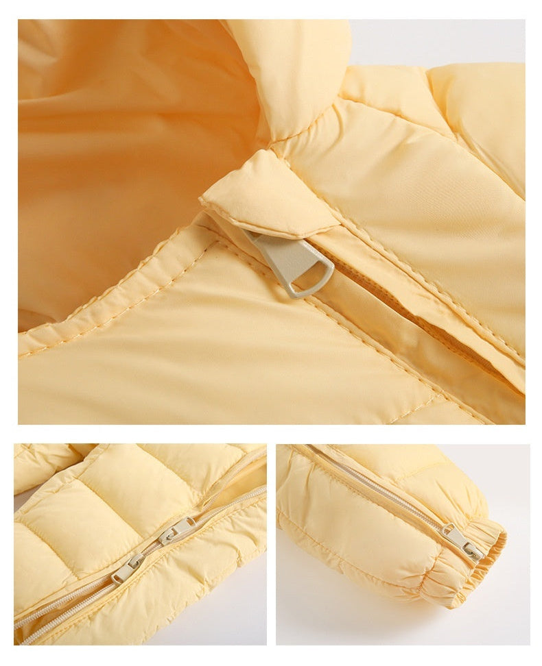 Close-up of double zipper and inner cotton lining on the baby romper – soft texture and easy-access design – beekaaboo.com