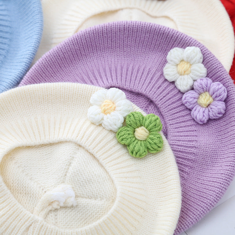 Close-up of the floral knit detail on baby girl beret – soft texture – beekaaboo.com