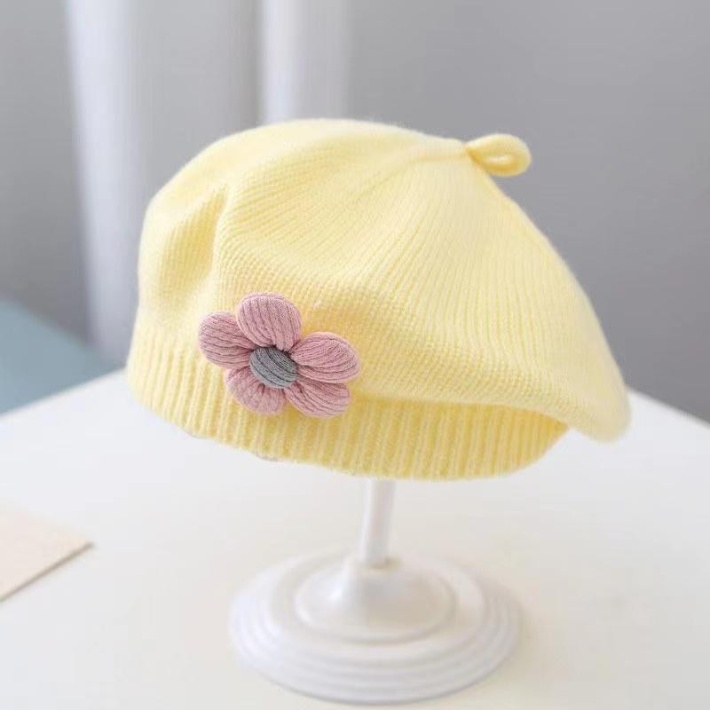 Yellow soft baby hat with small floral embellishment – winter style – beekaaboo.com