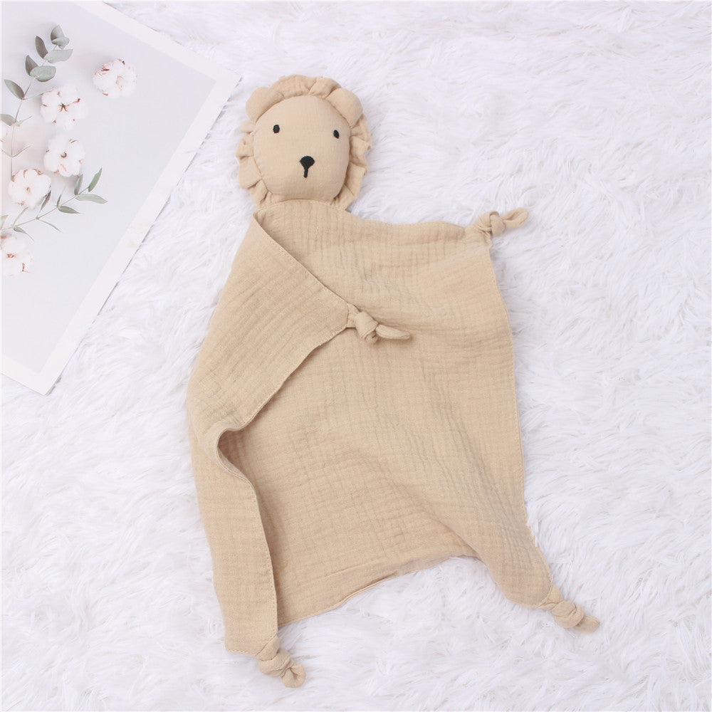 Khaki-colored muslin lion baby towel – cozy and neutral baby accessory – beekaaboo.com