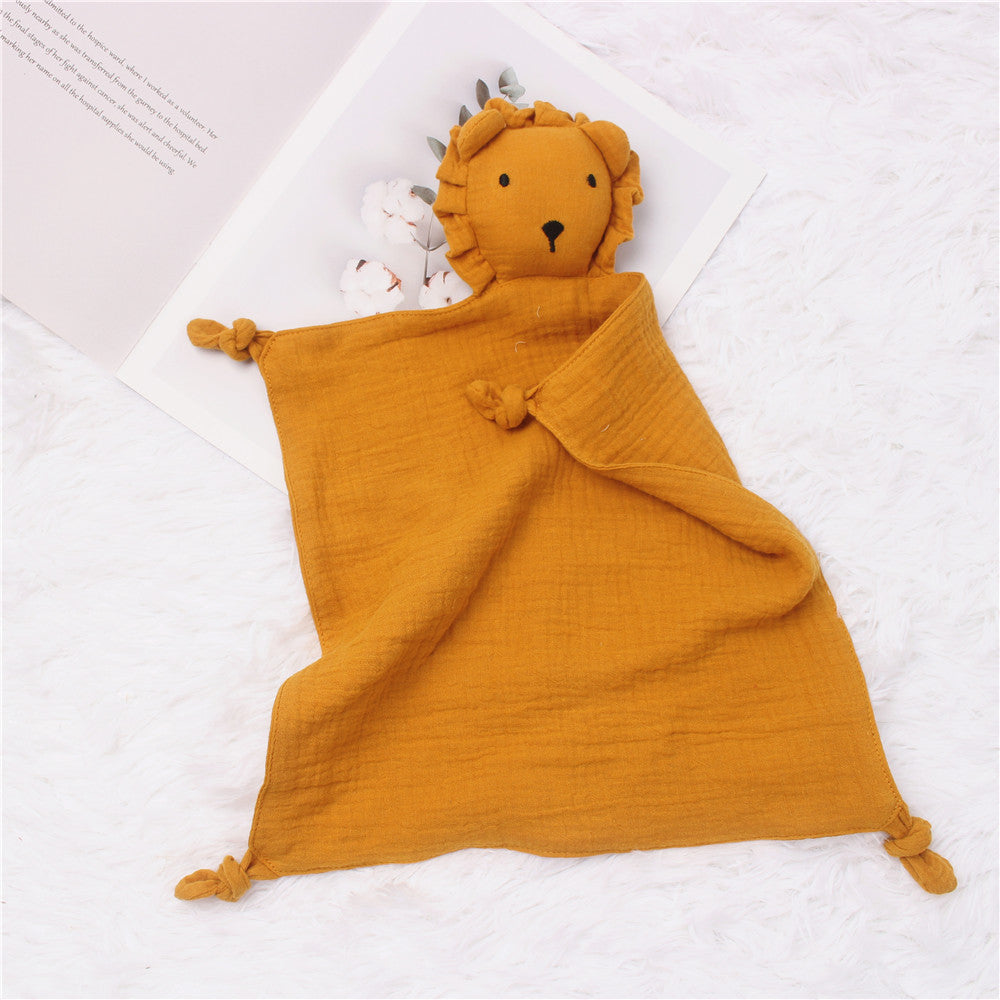 Warm turmeric-colored muslin lion comfort towel – perfect for snuggles – beekaaboo.com