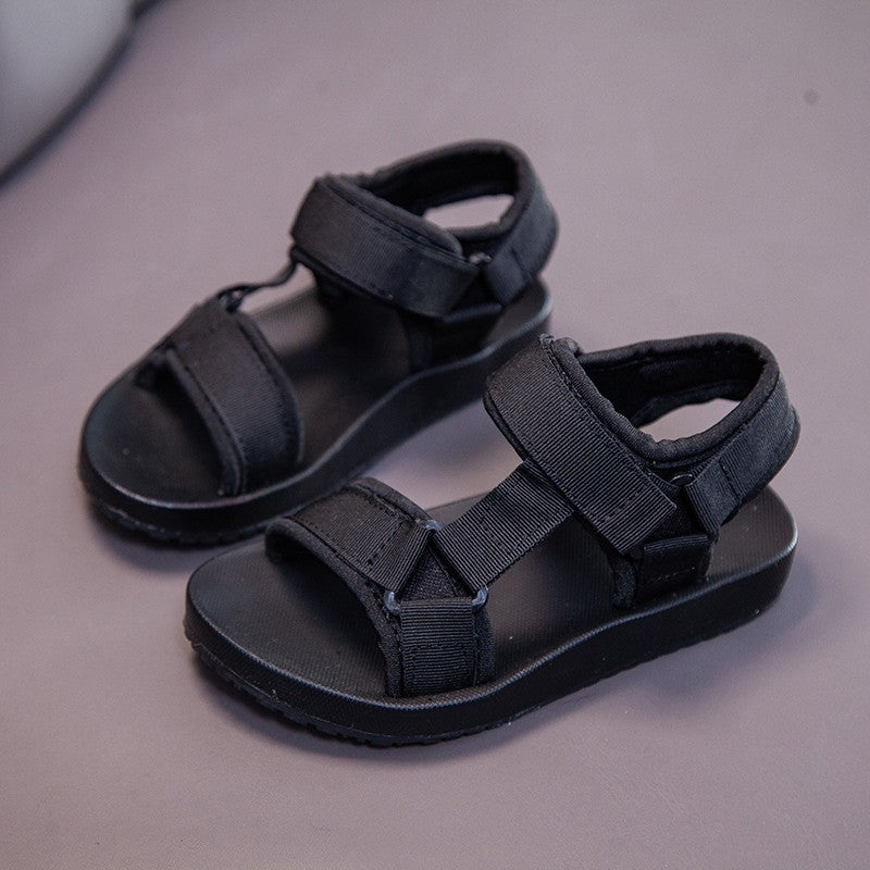 Classic black PU leather sandals for kids with slip-resistant soles – beekaaboo.com.