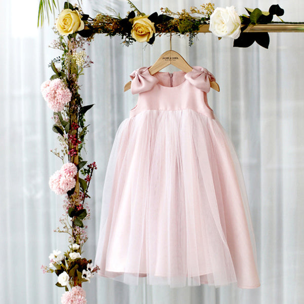 Baby girl pink princess dress with bow shoulders and layered puffy tulle skirt – front view – beekaaboo.com