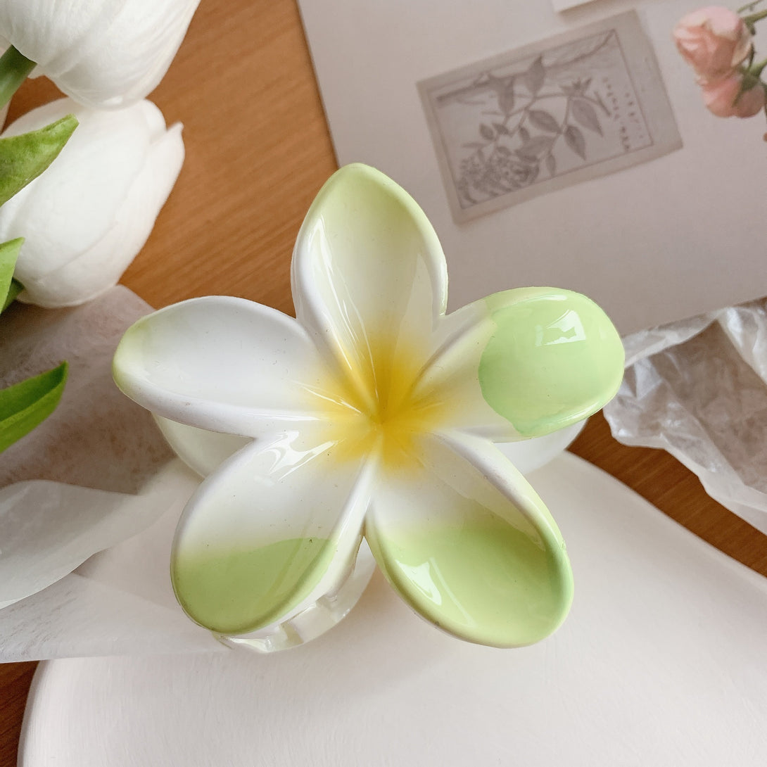 Green Plumeria hair clip – smooth, floral resin clip for stylish hair days – beekaaboo.com