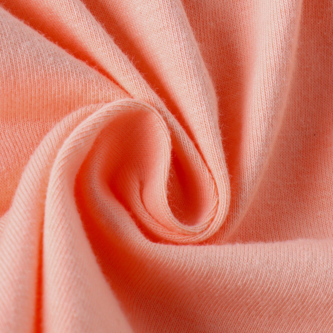 Soft breathable cotton texture close-up of baby girl summer jumpsuit – beekaaboo.com