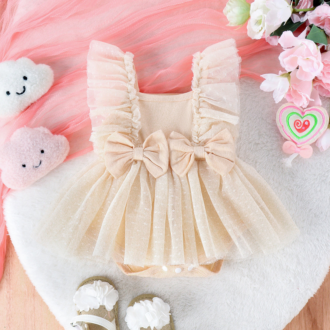 Front view of sleeveless apricot baby jumpsuit with soft net skirt overlay – beekaaboo.com