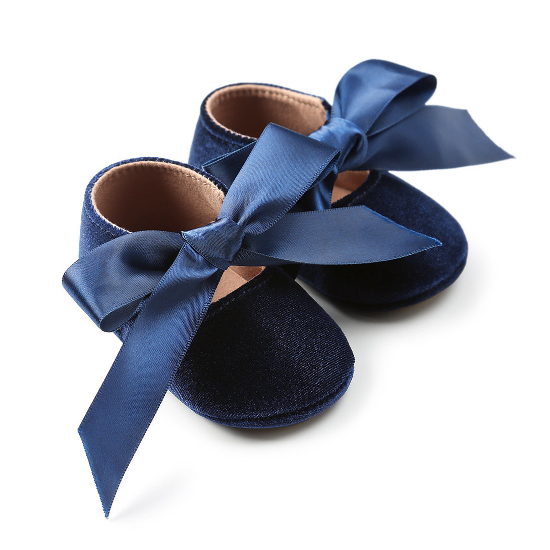 Chic blue baby princess shoes with ribbon accents, designed for comfort and cuteness. Find them at beekaaboo.com