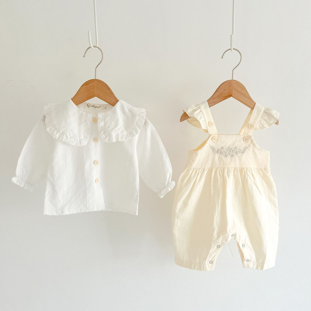 Apricot suspender romper and white top displayed side by side hanging – stylish and soft baby outfit – beekaaboo.com