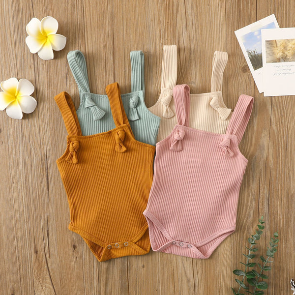 Display of all four color variations of sleeveless cotton baby romper – pink, beige, brown, and light green – beekaaboo.com