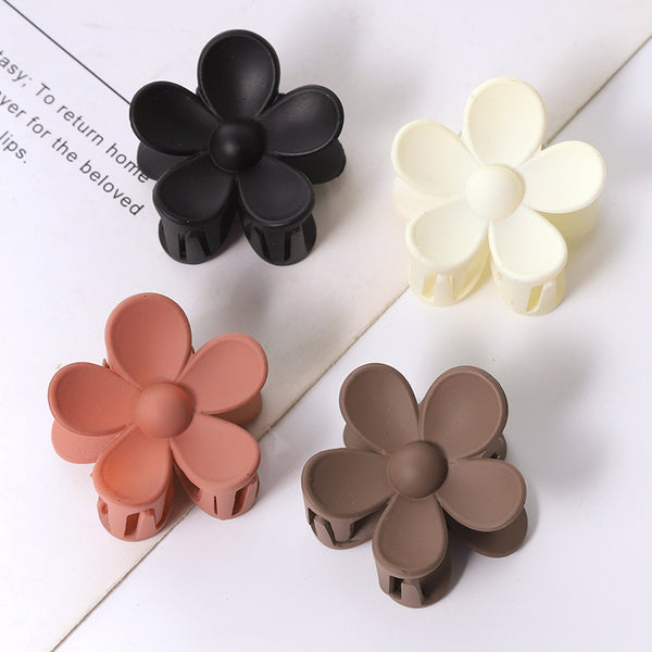 Display of all 5 color variations of soft matte flower hair clips – beekaaboo.com