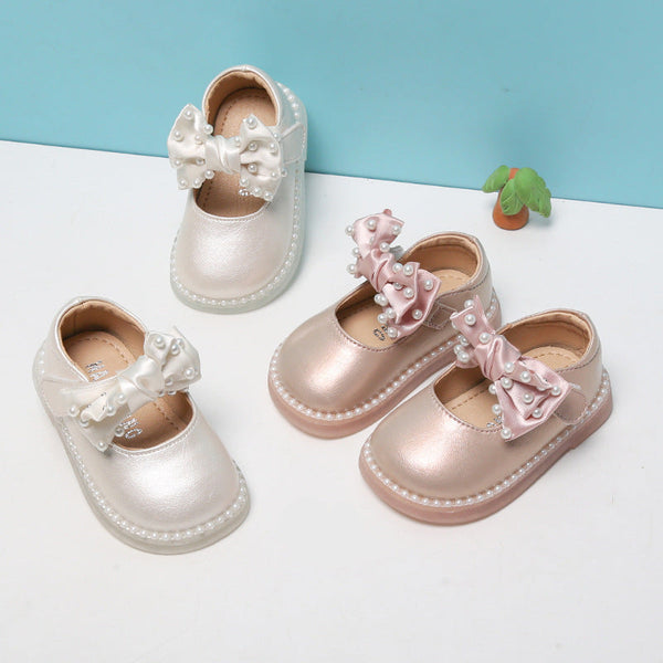 Two pairs of soft soled baby shoes in beige and pink colors – beekaaboo.com


