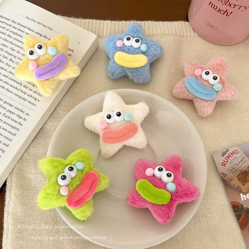 Top view of colorful plush star hair clips – gentle handmade accessories – beekaaboo.com