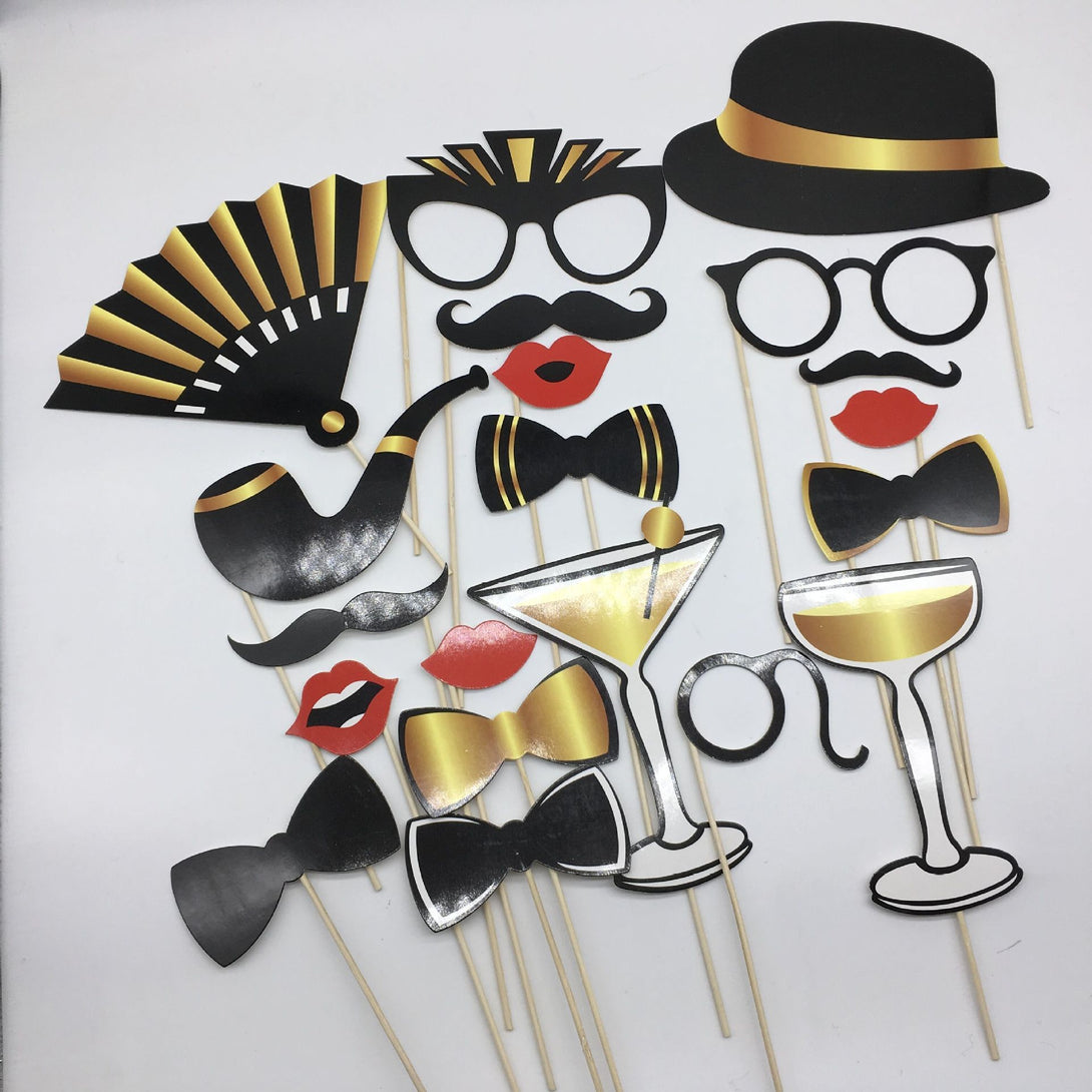 Many piece wedding photo props set including lips, signs, mustaches, and glasses – perfect for bridal photo booths – beekaaboo.com