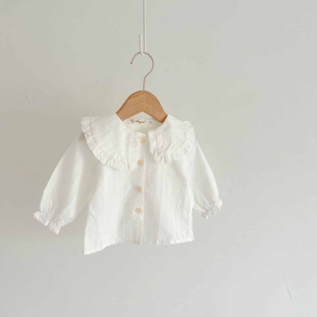 White long-sleeve baby shirt on hanger – clean and comfy cotton top – beekaaboo.com