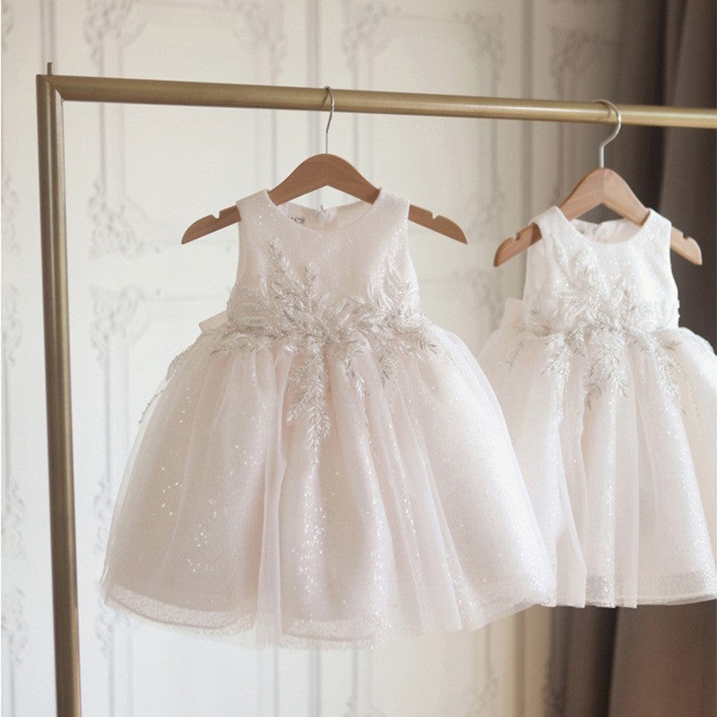 Front view of sleeveless white girls' princess dress with bow – elegant and simple – beekaaboo.com