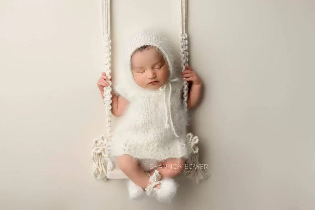 Rustic wooden baby swing prop shown in professional studio photo setup white color – ideal for newborn photography – beekaaboo.com