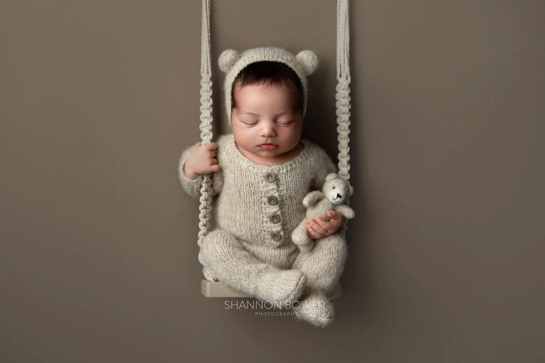 Front angle view of children's wooden photography swing prop – detailed look at rope and wood – beekaaboo.com