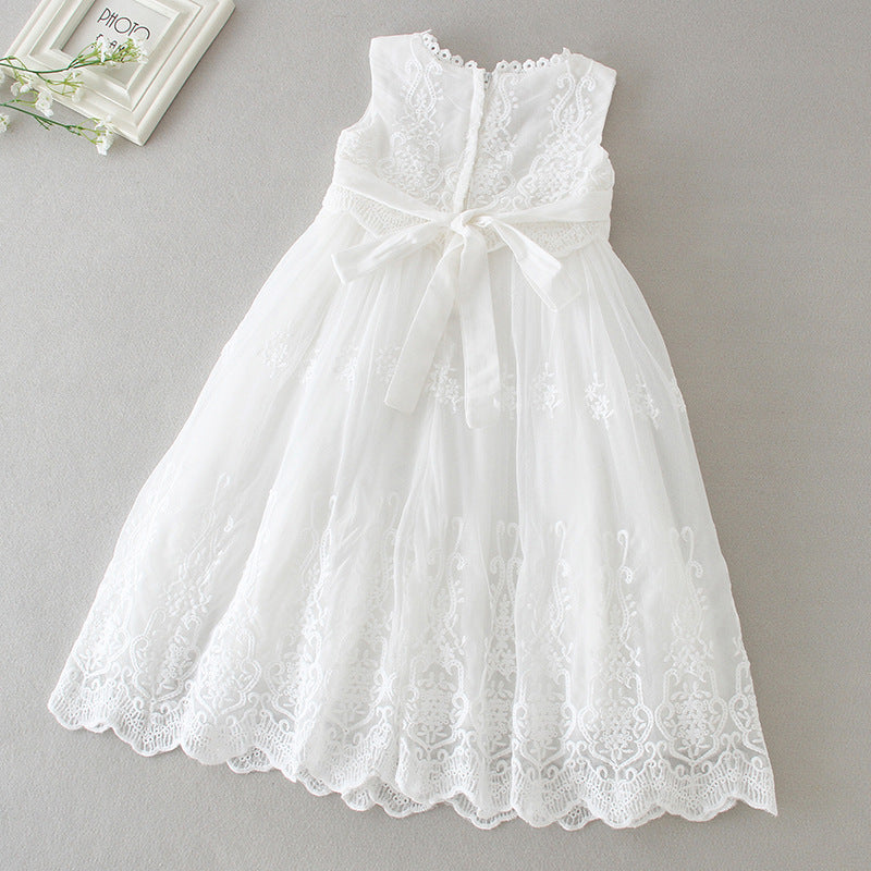 Sleeveless white baby dress with lace details and satin bow on back – ideal for christening – beekaaboo.com