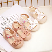 Cute baby girl sandals with bow detail front view – beekaaboo.com