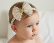 Baby tulle bow headband with star detail in beige | beekaaboo.com