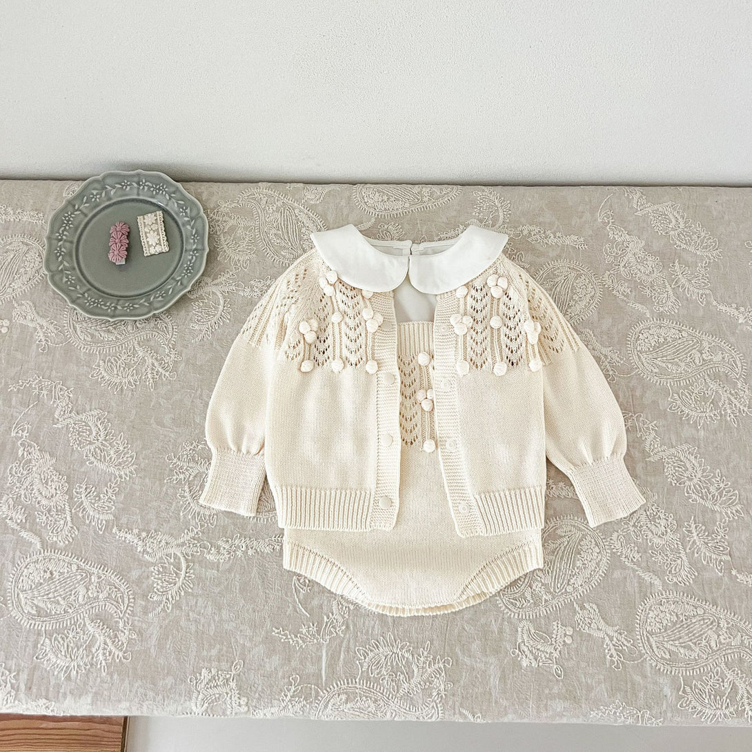 Cardigan and strap romper flat lay – ivory knit set – beekaaboo.com