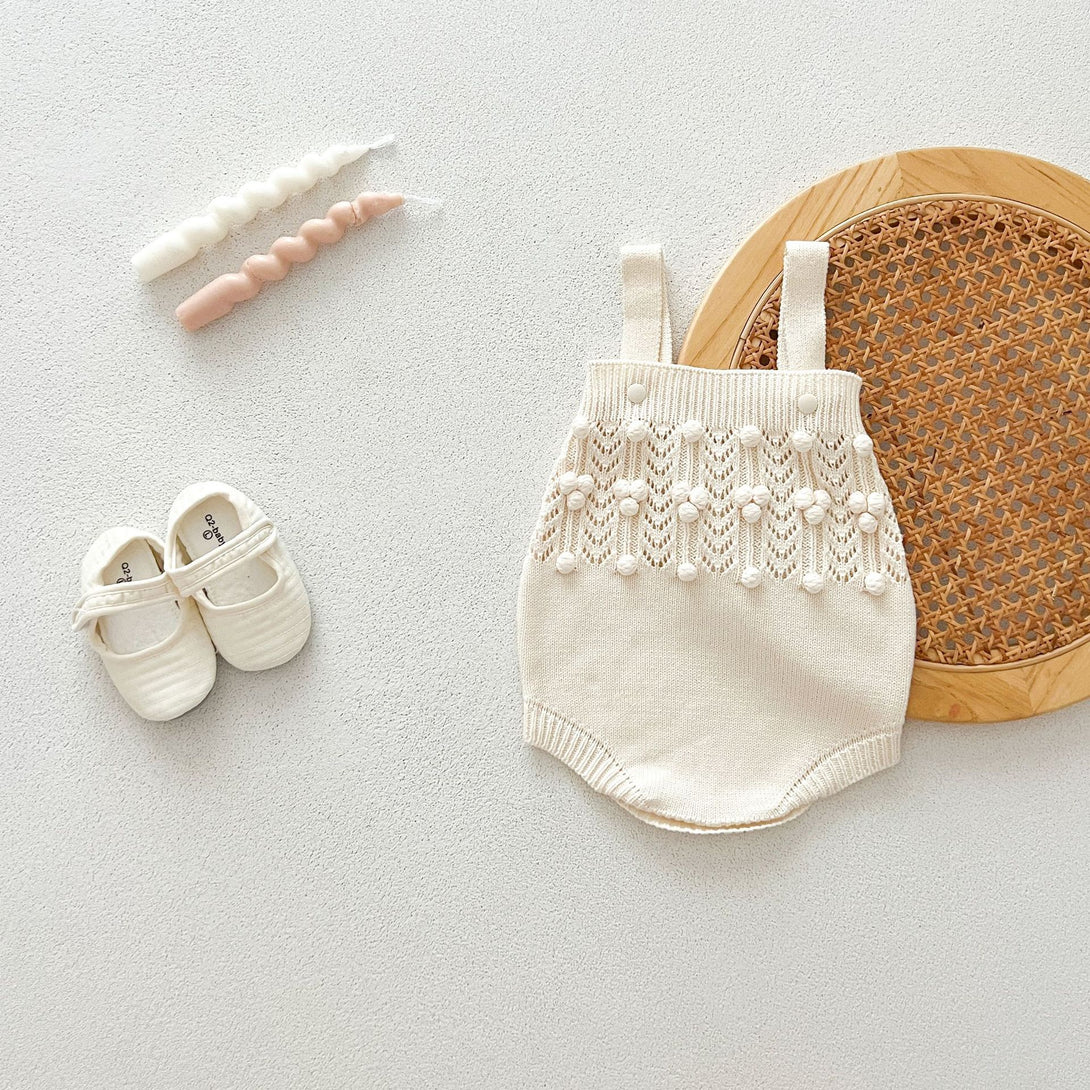 Strap romper flat lay – ivory knit set – beekaaboo.com