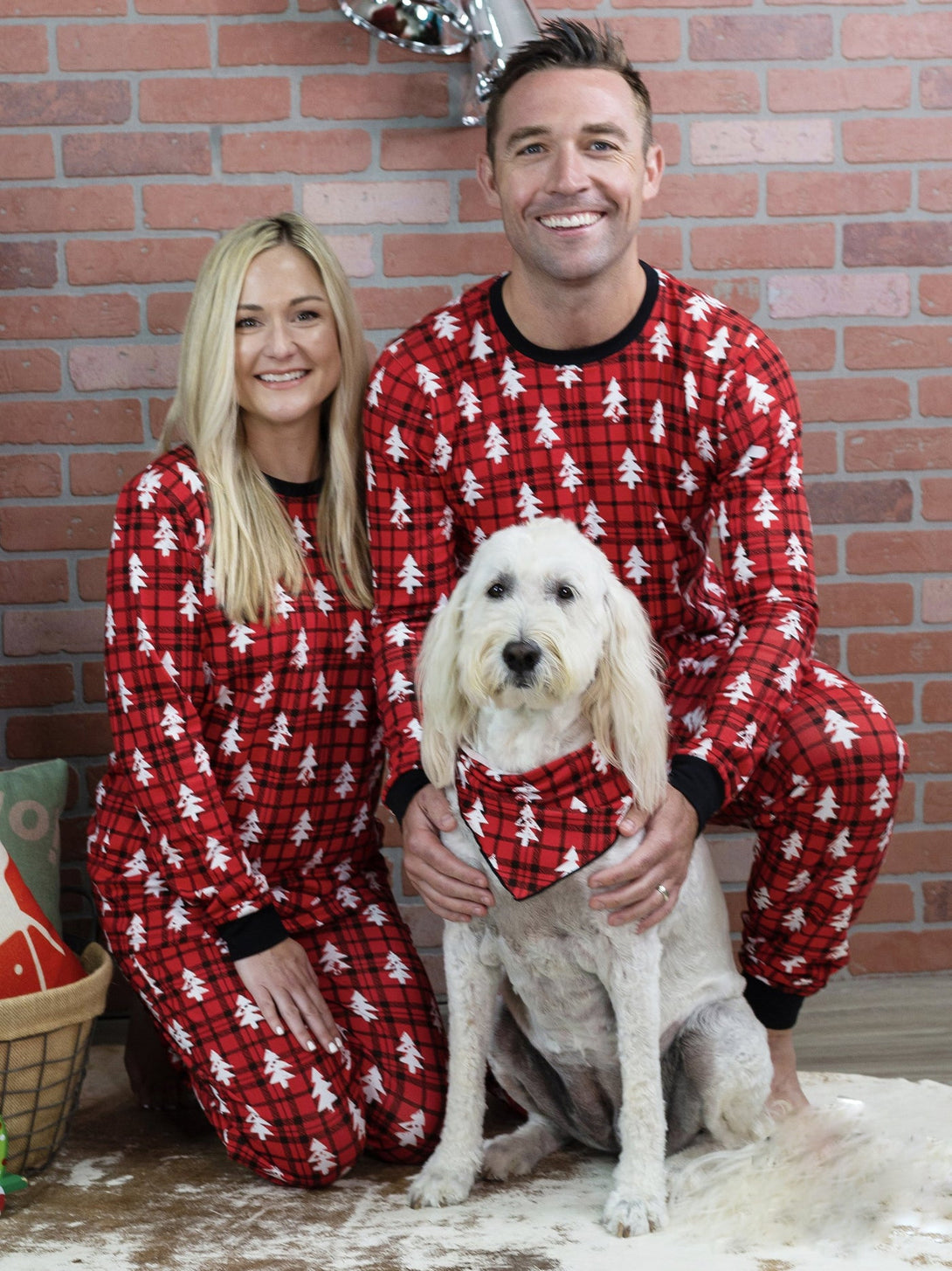 Family wearing matching red plaid Christmas pajamas – festive home photoshoot – beekaaboo.com