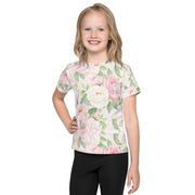 Girl wearing floral rose kids t-shirt with soft pink flowers from BEE KAA BOO beekaaboo.com