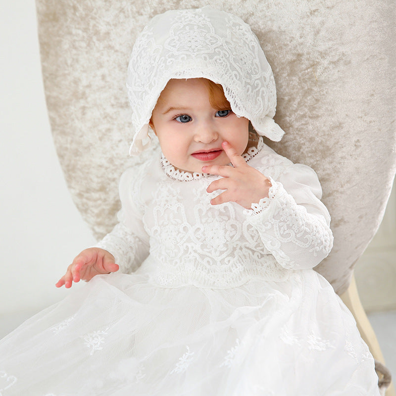 Close-up of baby in long sleeve formal dress showing embroidered lace and sleeve ruffle – beekaaboo.com