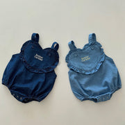 Heart detail denim baby romper in dark blue and light blue with ruffle accents beekaaboo.com