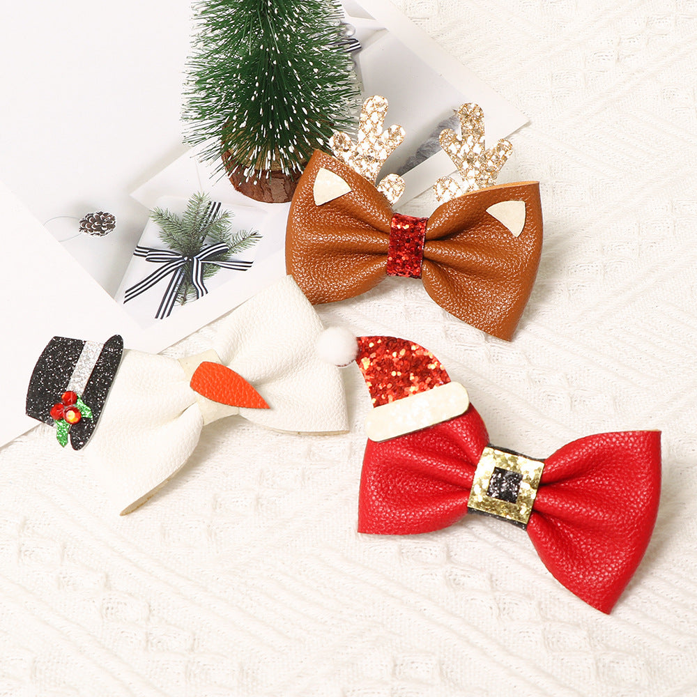 Festive Christmas bow hair clips with glitter design | BeeKaaBoo.com