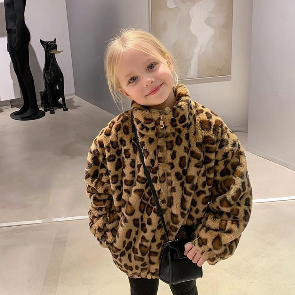Girl smiling in warm leopard print winter coat – Beekaaboo.com