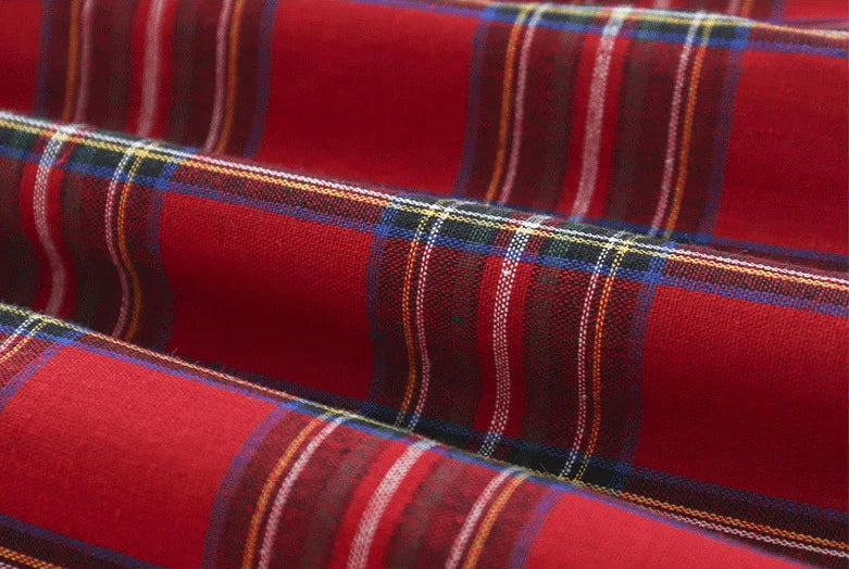 Red tartan fabric close-up for baby girls dress – beekaaboo.com