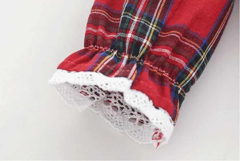 Sleeve and lace trim detail on red plaid baby dress – beekaaboo.com