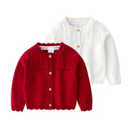 Red and white knitted cardigan for girls with embroidery – front view | beekaaboo.com