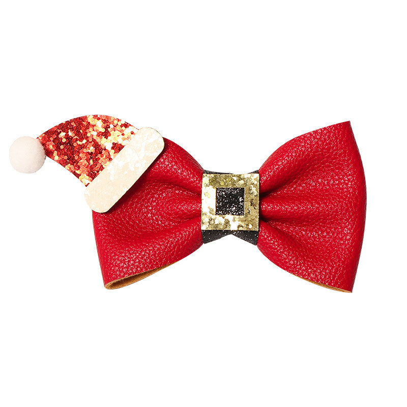 Red Santa hat bow hair clip with glitter details | BeeKaaBoo.com