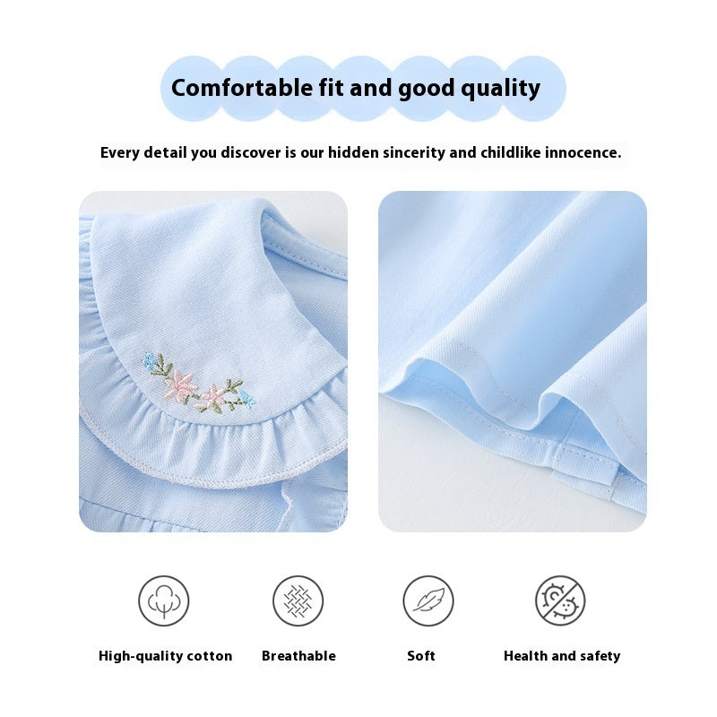 Close-up of soft and breathable cotton fabric with floral embroidery details for baby shirt | beekaaboo.com