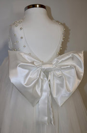 white tulle dress with large satin bow back detail for girls